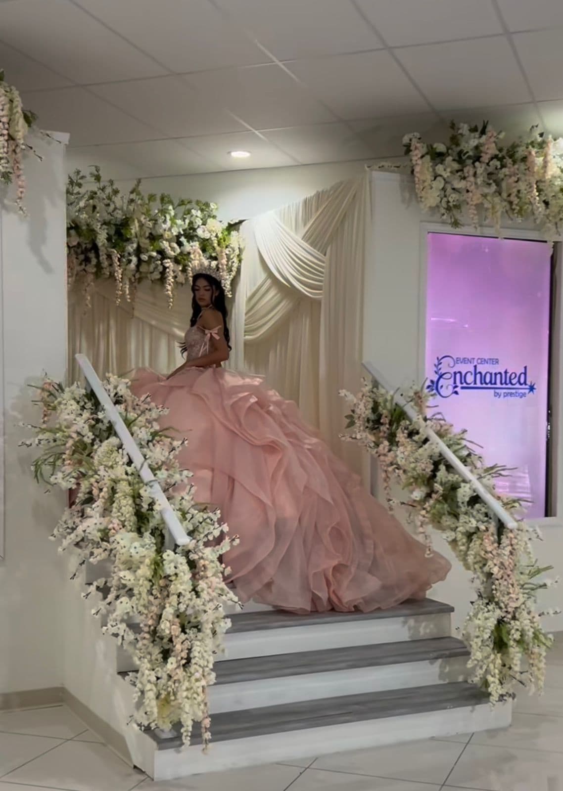 Elegant quinceañera celebration with gold and blush decor